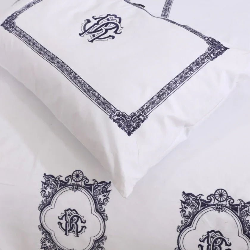 White With Navy Blue Embroidered Duvet Set - myhomestore.com.pk
